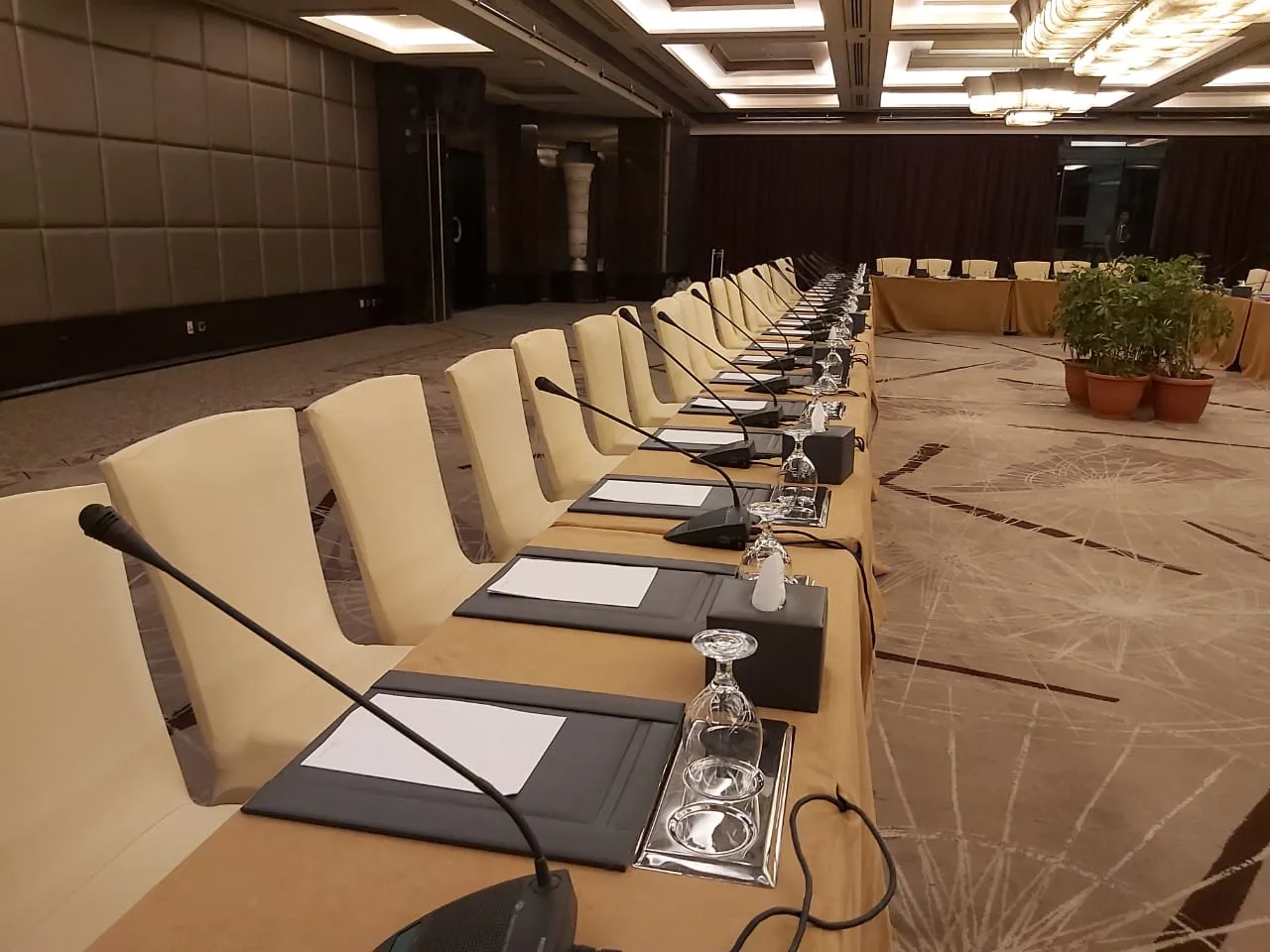 Conference delegate microphones arranged for a professional meeting