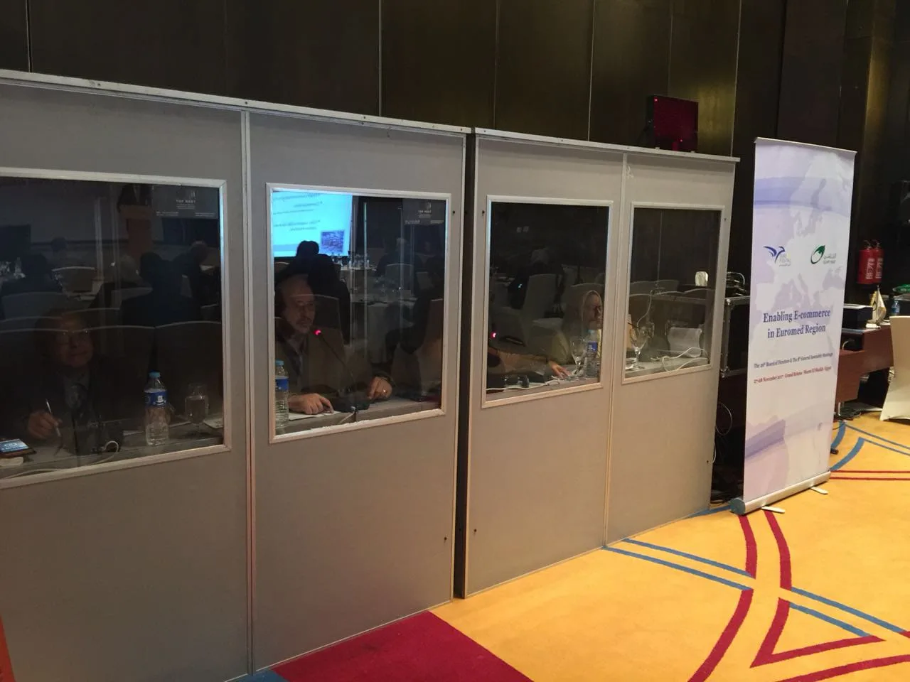 Simultaneous interpretation booths at a conference venue