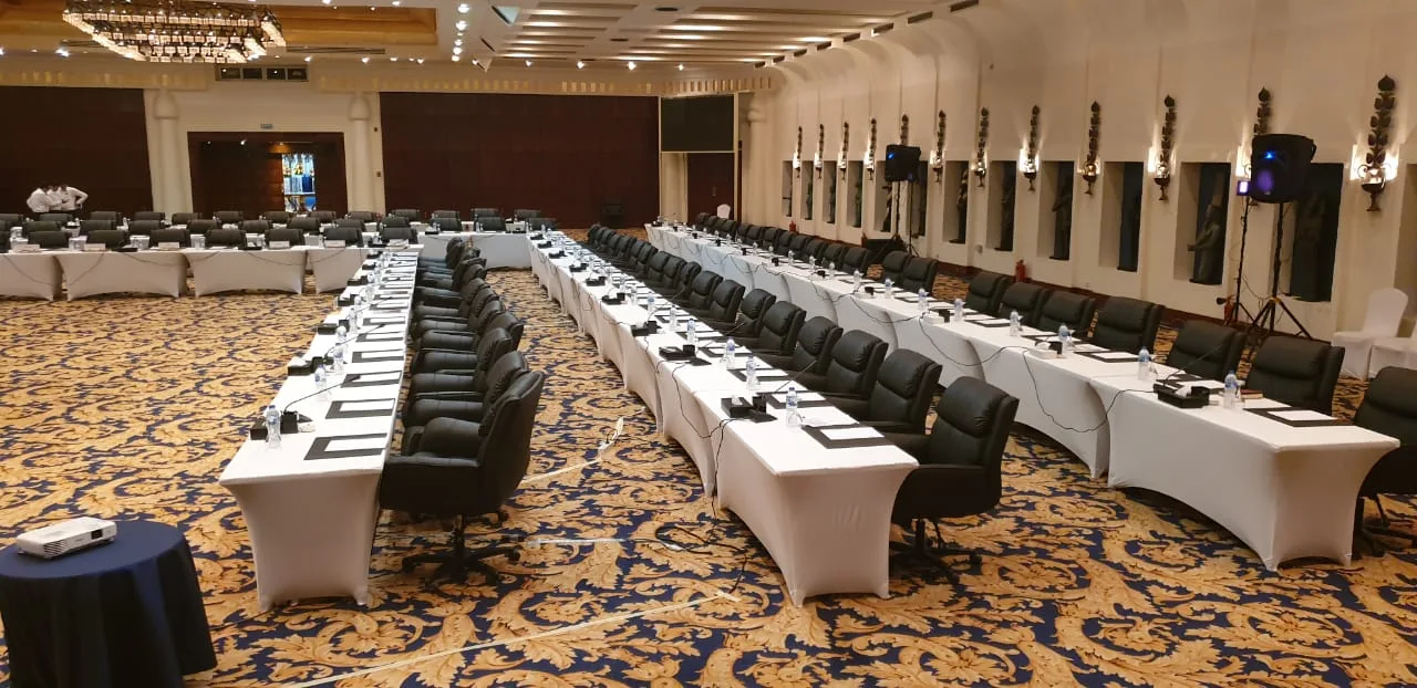 Professional corporate conference setup with delegate microphones