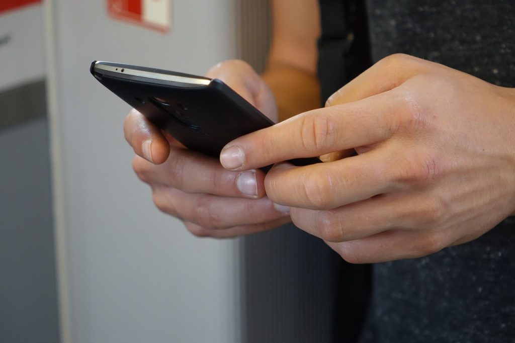 smartphone hands tap 2454611 scaled smartphone hands tap 2454611 scaled