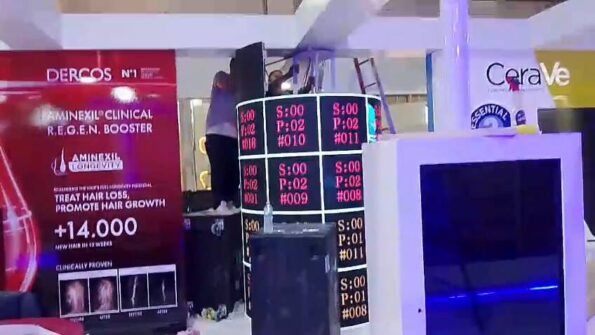 WhatsApp Video 2026 09 08 at 3.46.13 AM 037 L’Oréal Dermatological Beauty Exhibition Booth Egypt – Curved flexible LED display, interactive touch screens, exhibition booth technology integration by Hyper Sonic Egypt