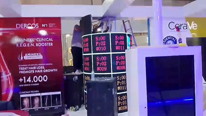L’Oréal Dermatological Beauty Exhibition Booth Egypt – Curved flexible LED display, interactive touch screens, exhibition booth technology integration by Hyper Sonic Egypt