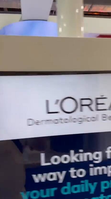 L’Oréal Dermatological Beauty Exhibition Booth Egypt – Curved flexible LED display, interactive touch screens, exhibition booth technology integration by Hyper Sonic Egypt